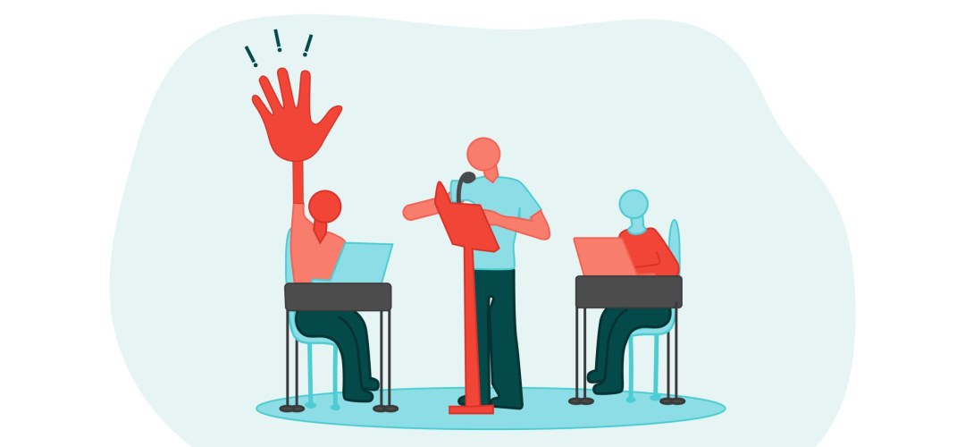 Three human figures are in a classroom setting. One appears to be standing, and is gesturing towards a sitting figure raising its hand